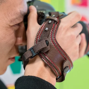  Камера Кожаный ремешок на запястье Портативный держатель ручного ремня Противоударный ремень для аксессуаров для камер Canon / Nikon / Sony / DSLR