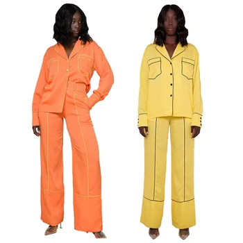 Модные женские пижамные комплекты 2023 Новая весна Осень Сплошной цвет Две шт. Брюки с длинным рукавом Карман на пуговицах Женские причинно-следственные костюмы